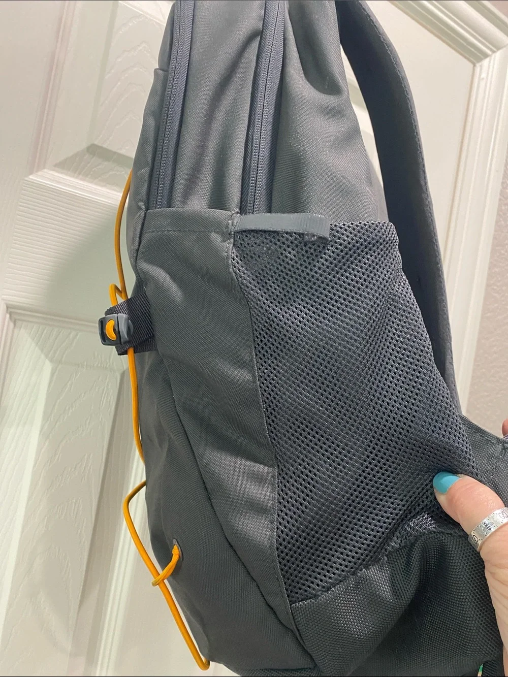 The North Face Dark Gray Jester Backpack with Orange Bungee